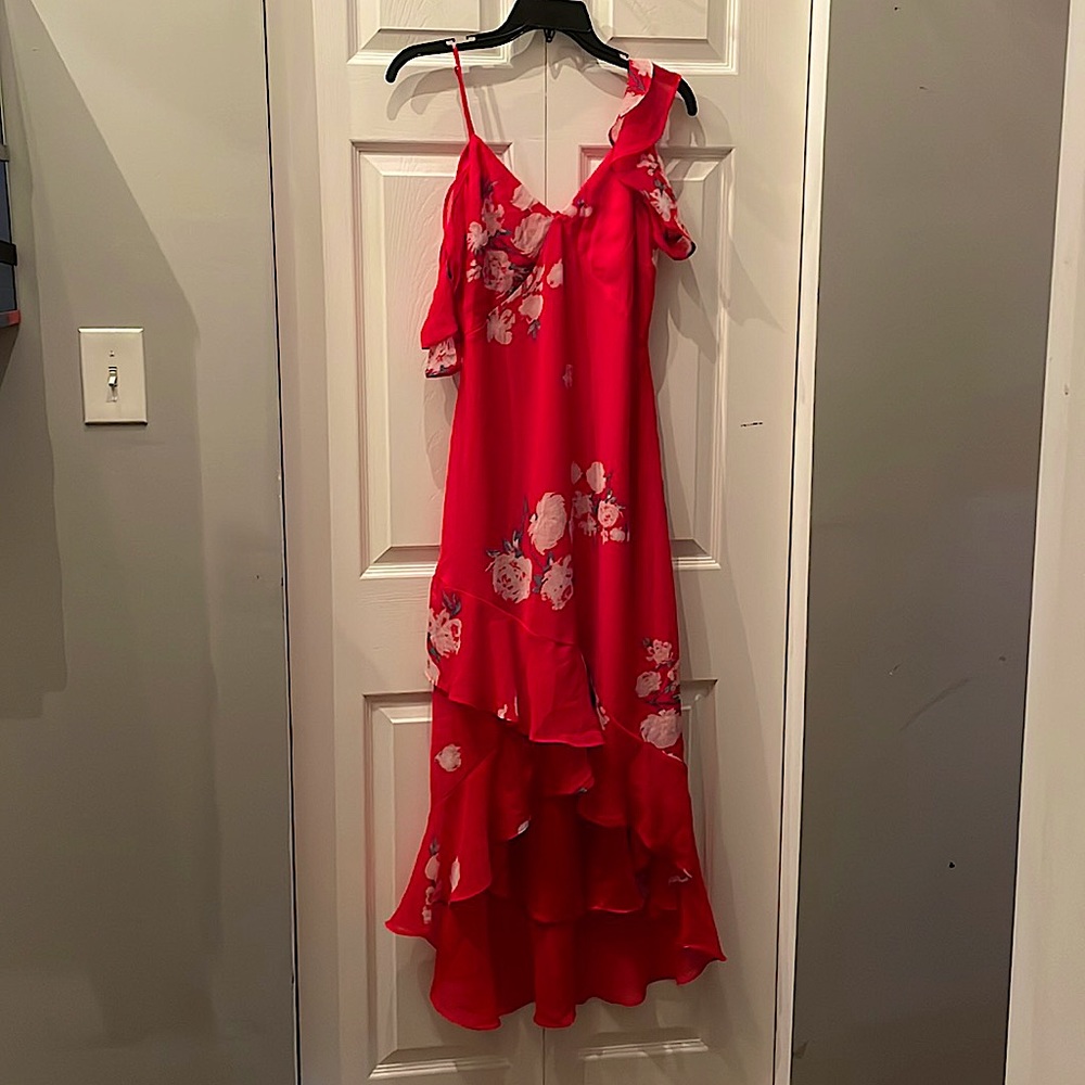 Stand out with this beautiful red flowery dress!